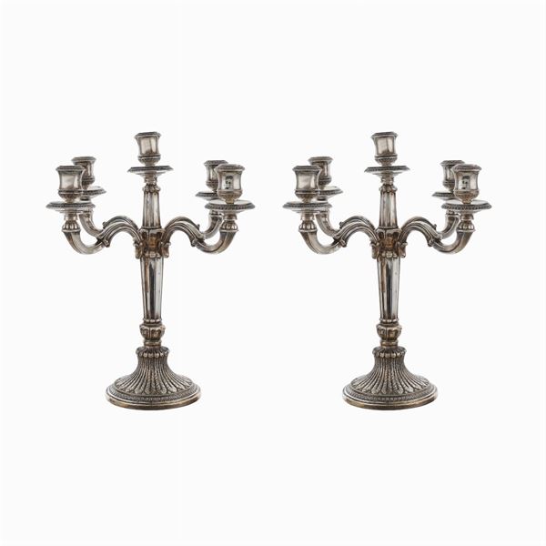 Coppia di candelabri a cinque luci in argento