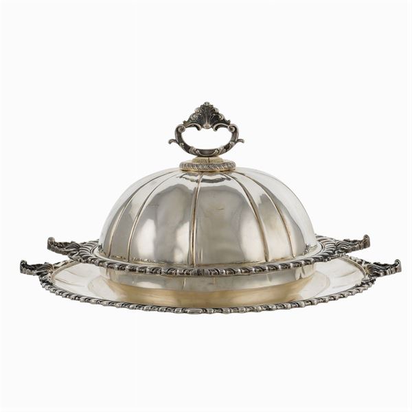 An italian silver vegetable dish with presentoire
