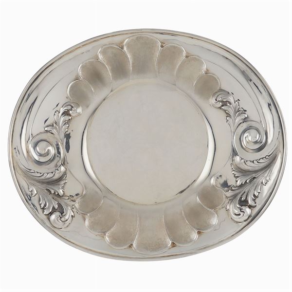 An oval silver plate