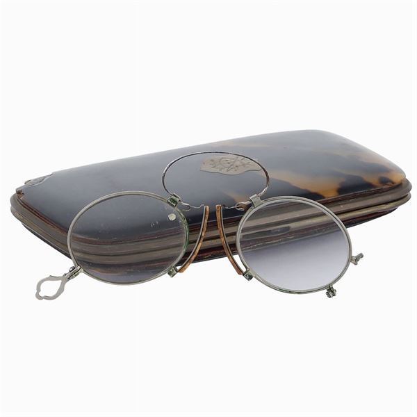 A Turtle and golden metal antique eyeglasses case