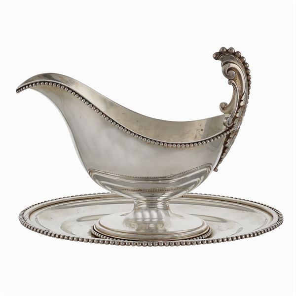 A silver sauce boat resting on an oval tray  (Italy, 20th century)  - Auction Fine jewels and watches, silver and coptic textile fragments - Colasanti Casa d'Aste
