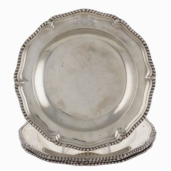 Set di quattro piatti in argento