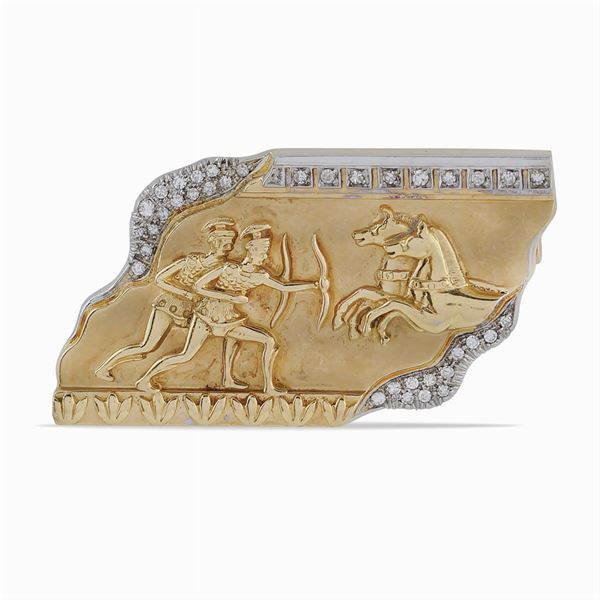 Spilla in oro giallo e bianco 18kt