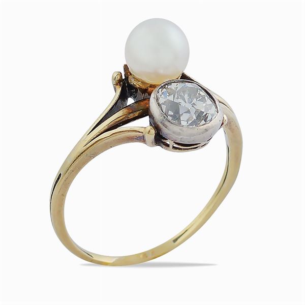 Anello contrariè in oro giallo e argento