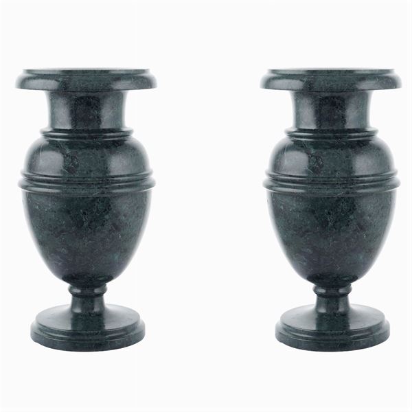A pair of green marble baluster vases