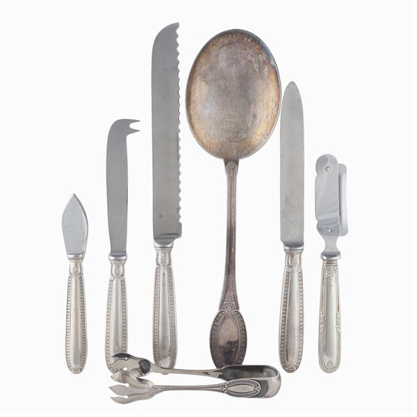 Seven silver serving cutlery service