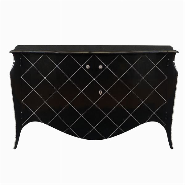 A wavy lined dresser