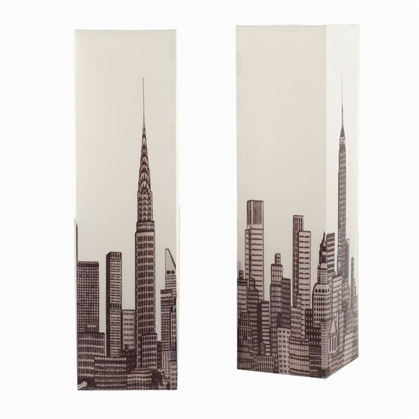 A pair of plastic table lamps