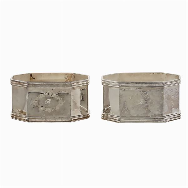 Twelve silver napkin holders