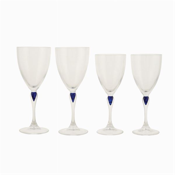 A crystal glass service (32)