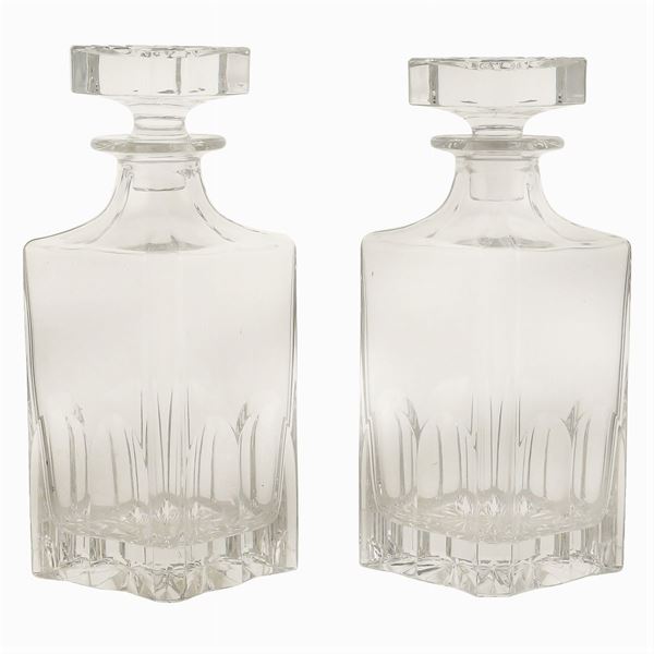 A pair of cut crystal liquor bottles