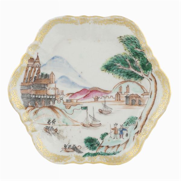 A small porcelain plate with shaped profile