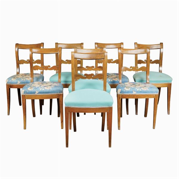 Eight walnut wood chairs