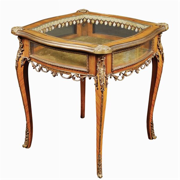 A Napoleon III style glass-topped display table