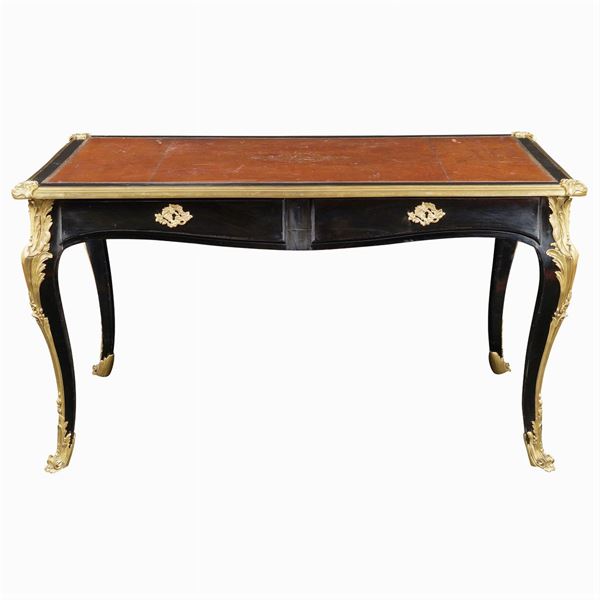 An ebony wood centerpiece bureau