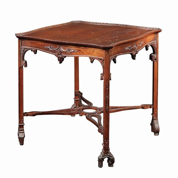 A mahogany centerpiece table