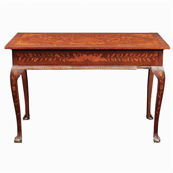 A mahogany centerpiece writing desk