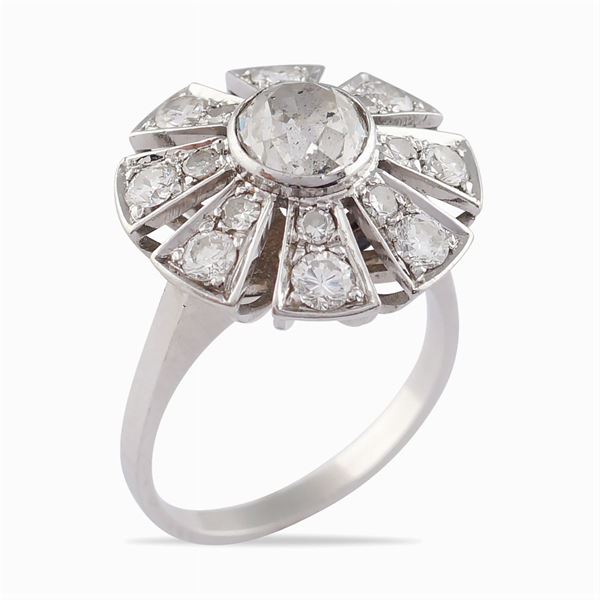 A white gold ring with diamond rose