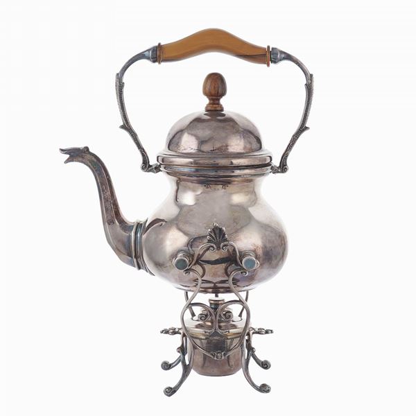 A silver tea kettle