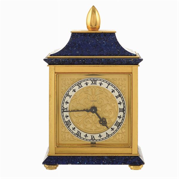 A Luxor brass alarm clock