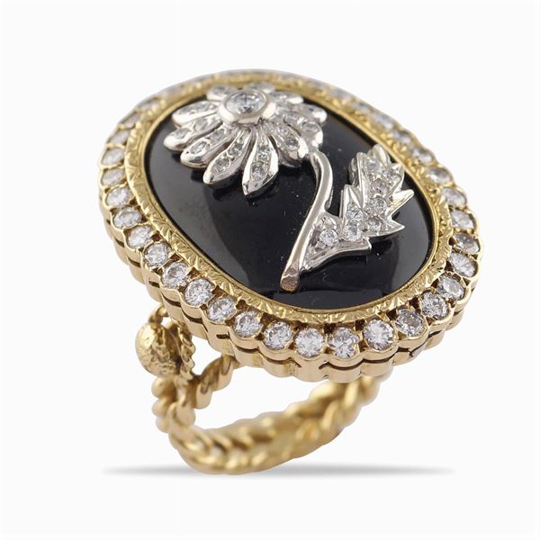 Anello in oro giallo e bianco 18kt