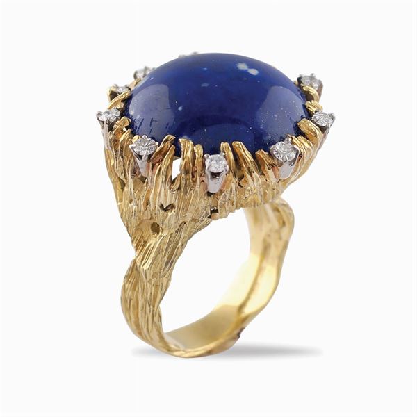 Anello scultura in oro giallo e bianco 18kt
