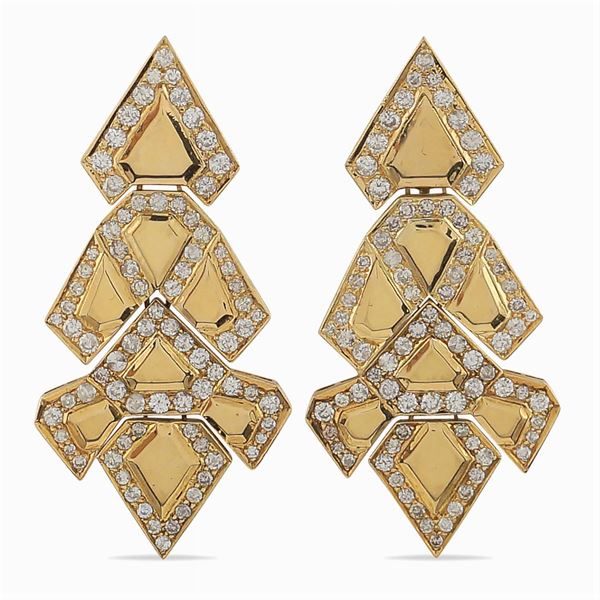 Pendant earrings with geometric patterns
