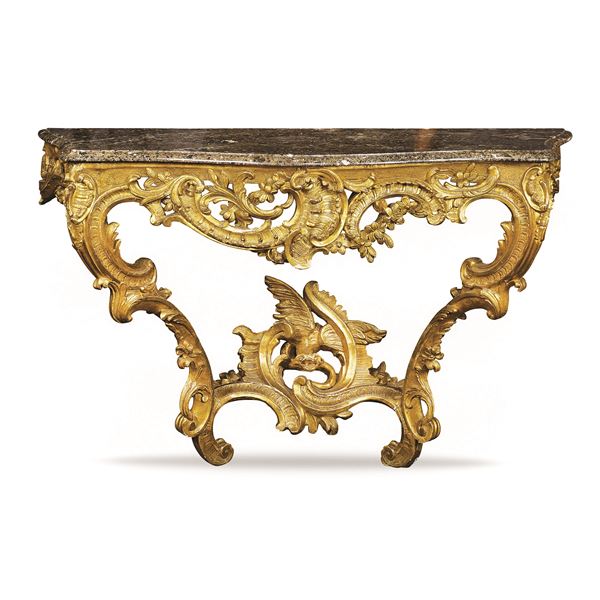 A golden wooden wall console