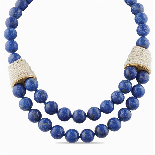A gold and lapis lazuli collar necklace