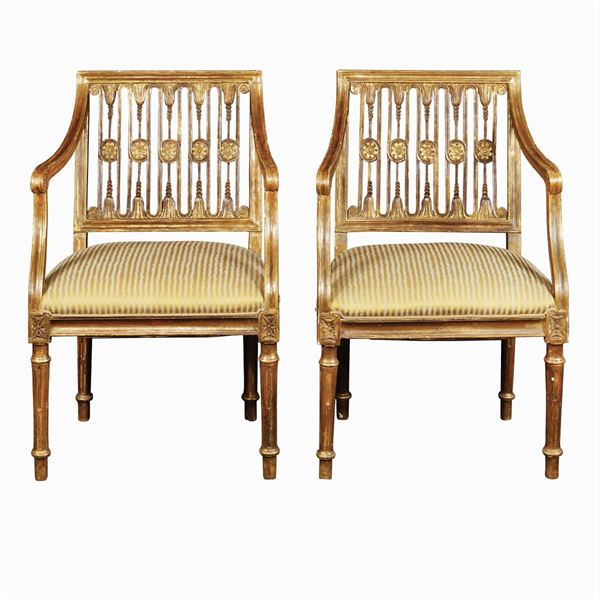 A pair of giltwood chairs