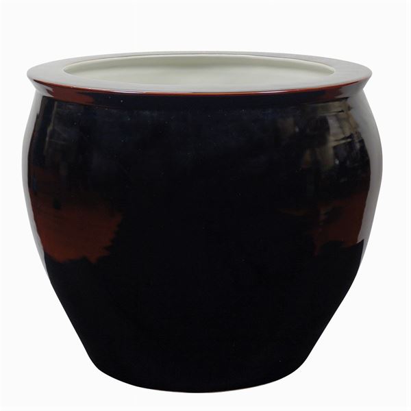 A monochrome porcelain fish bowl