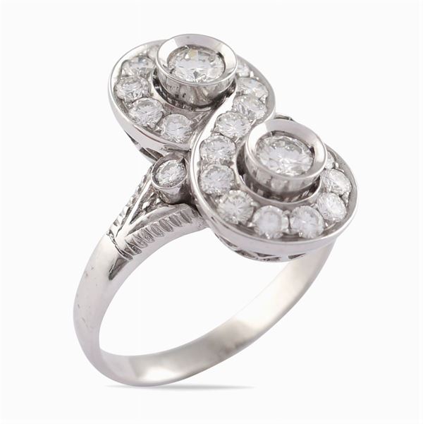 Anello "infinito" in oro bianco 18kt