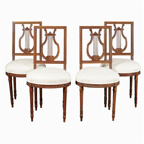 Four walnut chairs