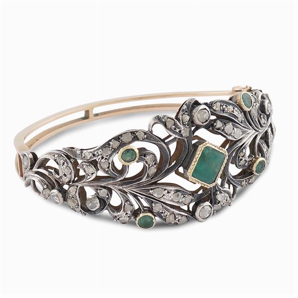 A rose gold and silver bangle bracelet