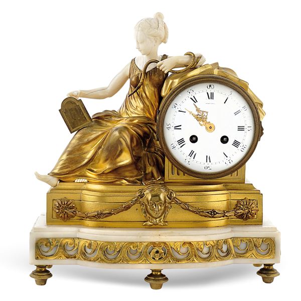 A golden bronze Louis XVI pendulum clock