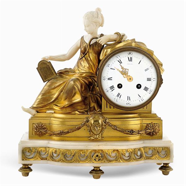 A golden bronze Louis XVI pendulum clock
