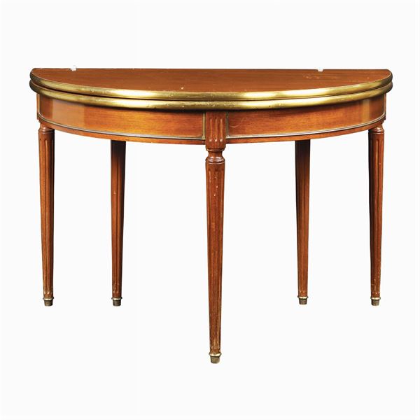 An expandable half moon shaped table