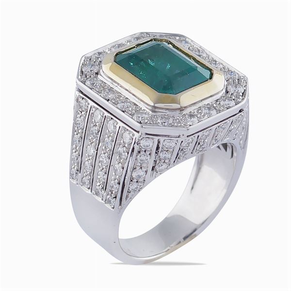 Anello in oro due colori 18kt e smeraldo