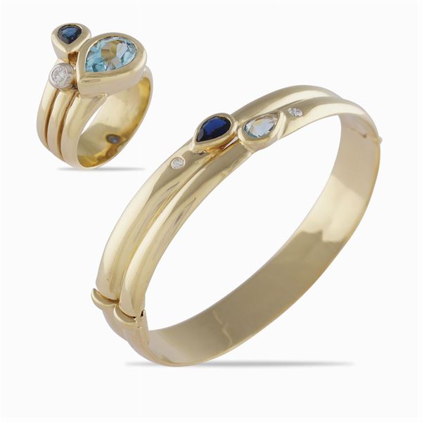 A bangle bracelet and ring parure