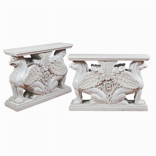 A pair of white marble bases