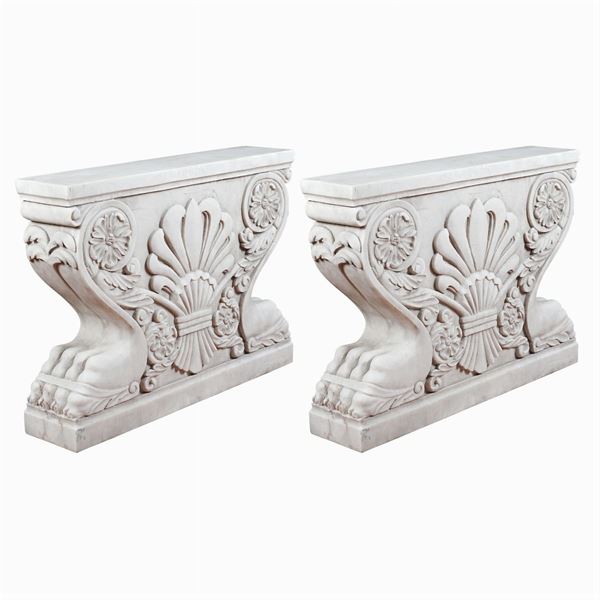 A pair of white marble bases