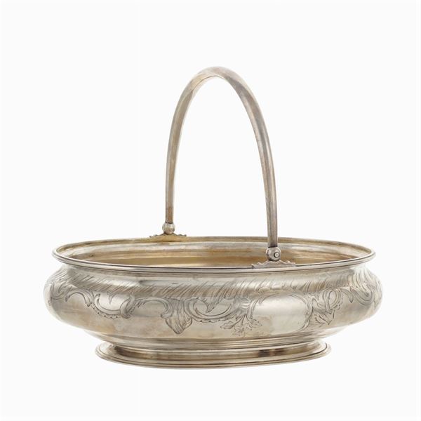A silver basket with handle