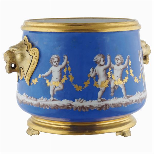 A blue and golden porcelain cachepot