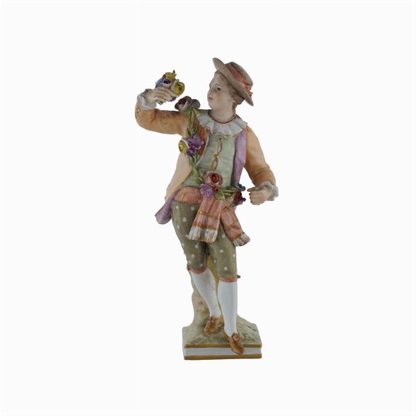 A figure in polychome porcelain