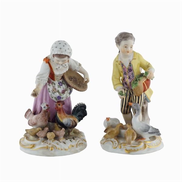 Meissen, coppia di figure in porcellana policroma