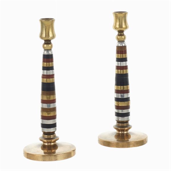 A pair of brass chandelabra