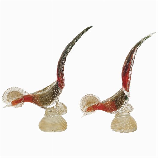 A pair of colored glass birds