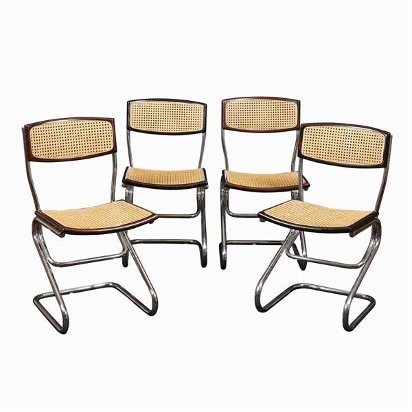 Four design chairs