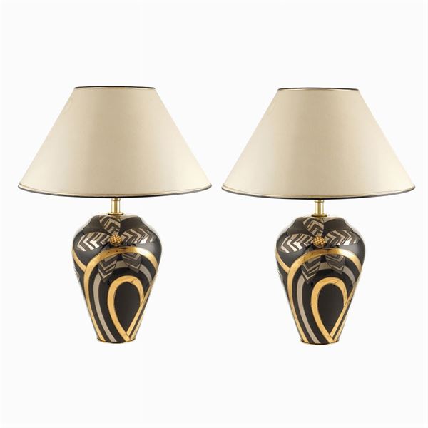 Coppia di lampade da tavolo in ceramica nera e dorata