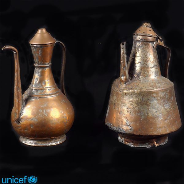 Two copper jugs - defects